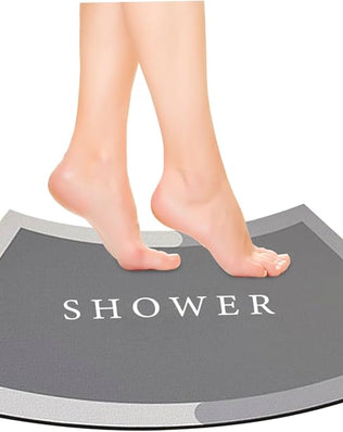 Problems Solved curved shower mat with absorbent, non-slip surface and quadrant design for safe, comfortable bath use.