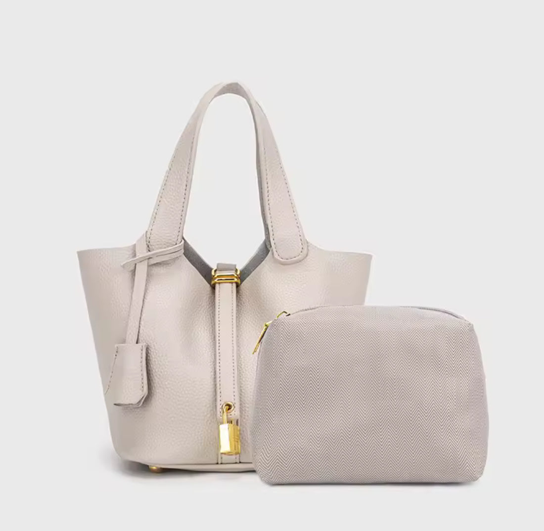 Classic Vegetable Women's Handbag by Problems Solved, simple bucket bag with a natural vegetable-tanned leather finish.