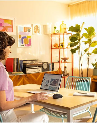 Problems Solved Logitech M240 Silent Bluetooth wireless mouse, compact and portable with smooth tracking on a clean desk surface.