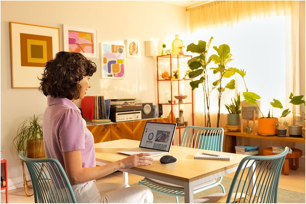 Problems Solved Logitech M240 Silent Bluetooth wireless mouse, compact and portable with smooth tracking on a clean desk surface.