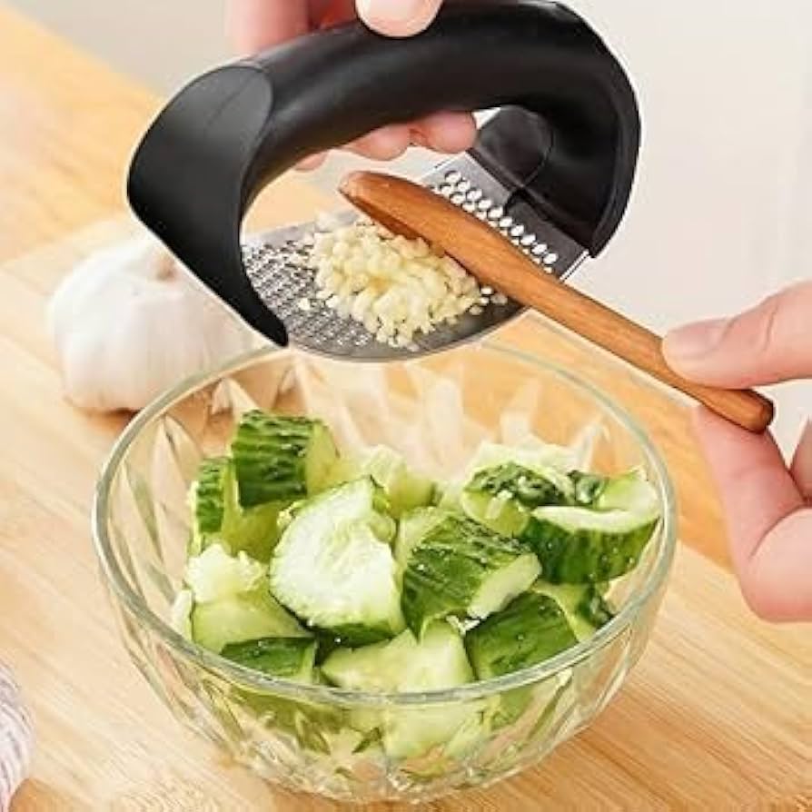 Problems Solved stainless steel garlic press with ergonomic handle and garlic crusher for efficient garlic mincing.