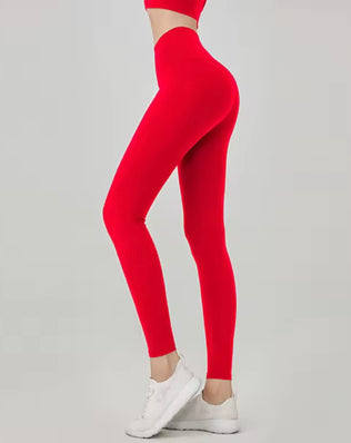 Women’s solid color high waist elastic fitness pants by Problems Solved, featuring a tight fit and sleek athletic style.