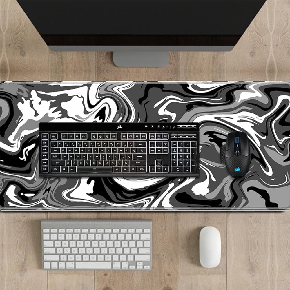 Problems Solved large mouse pad desk mat with non-slip rubber base, stitched edges, measuring 70x30cm for smooth computer use