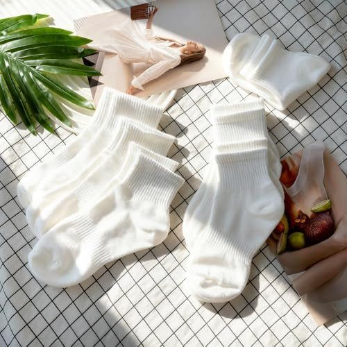 Pair of Problems Solved women's breathable wicking ankle socks with cushioning, shown in a close-up image.