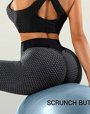 Women’s high-waisted gym leggings with tummy control and butt lift design, by Problems Solved, shown on a model.