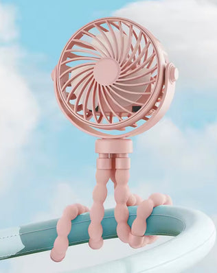 Problems Solved mini portable pram fan clipped onto a stroller, showing its small rechargeable and detachable design.