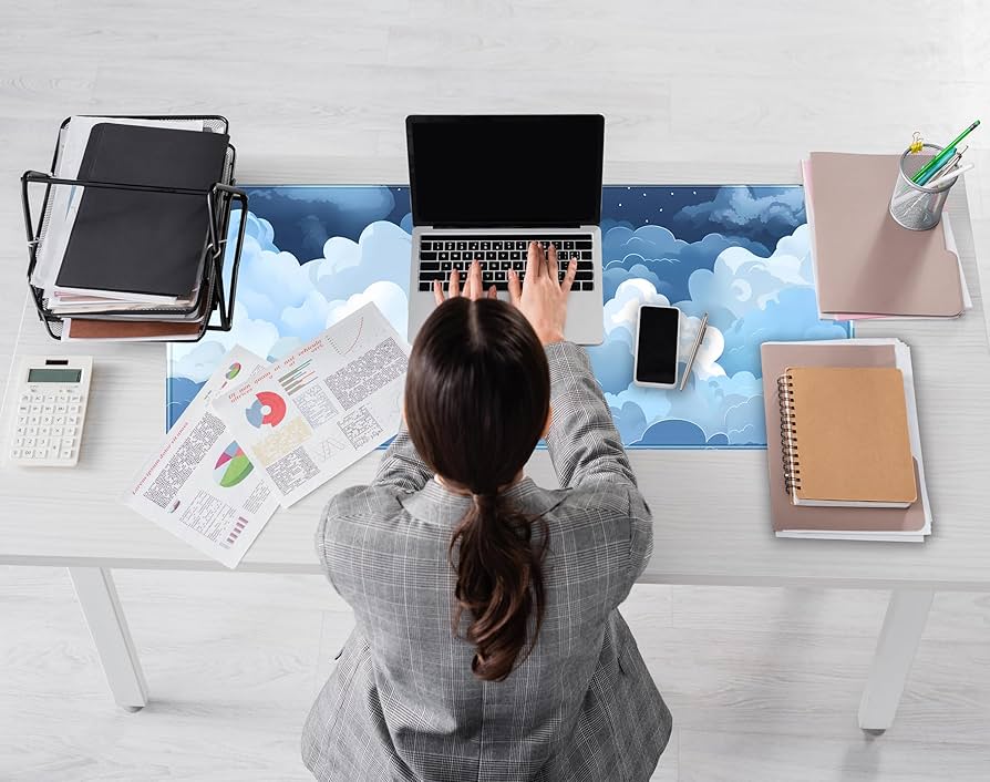 Problems Solved blue and white puffy clouds desk mat, cute gaming mouse pad with soft cloud design on smooth surface.