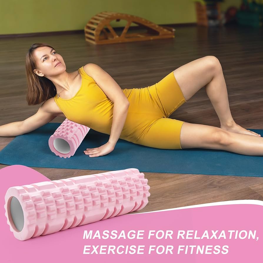 Problems Solved pink Pilates foam roller with yoga column and fascia roller for stretching and muscle recovery.