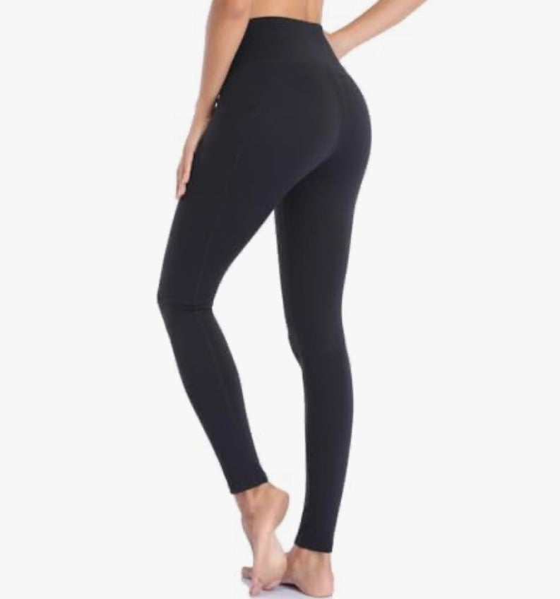 Women's high waist sports leggings with pockets by Problems Solved, shown in black, featuring a stretchy fit and convenient pocket details.