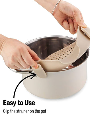 Problems Solved silicone pot strainer clip on for pots and pans, heat-resistant kitchen pot drainer in use.