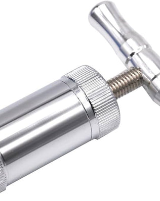 Problems Solved Tool Pollen T Press with T-handle for compressing pollen or herbs, featuring a durable metal construction.