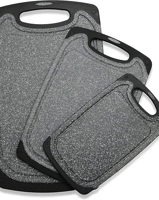 Set of three Problems Solved chopping boards, including various sizes, made of durable wood for food prep and cutting tasks.
