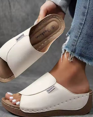 Women wedge slippers from Problems Solved, summer 2025 new fashion slippers with comfortable wedge heel and casual design.
