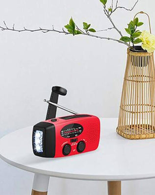 Problems Solved emergency radio with 2000mAh power bank, hand crank, solar panel, and flashlight for outdoor preparedness.