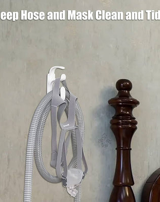 Problems Solved CPAP hose holder hanger, 2-pack, for tubing support and organization in sleep apnea breathing systems.