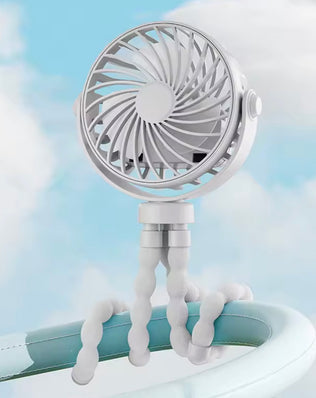 Mini portable pram fan by Problems Solved, rechargeable clip-on stroller fan with detachable design for cooling on the go.