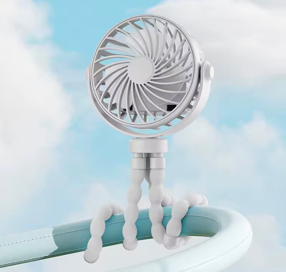 Mini portable pram fan by Problems Solved, rechargeable clip-on stroller fan with detachable design for cooling on the go.