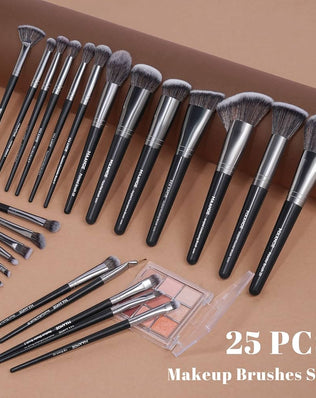 Problems Solved 25-piece professional makeup brush set with foundation and blush brushes, displayed with various brush shapes and sizes.