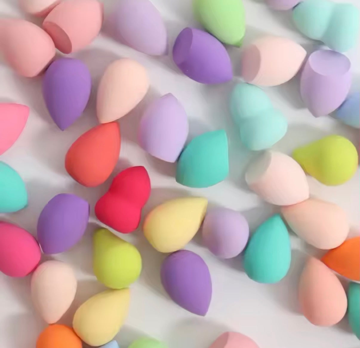 20-piece professional latex-free makeup sponge set by Problems Solved, showing soft, rounded sponges for flawless application.