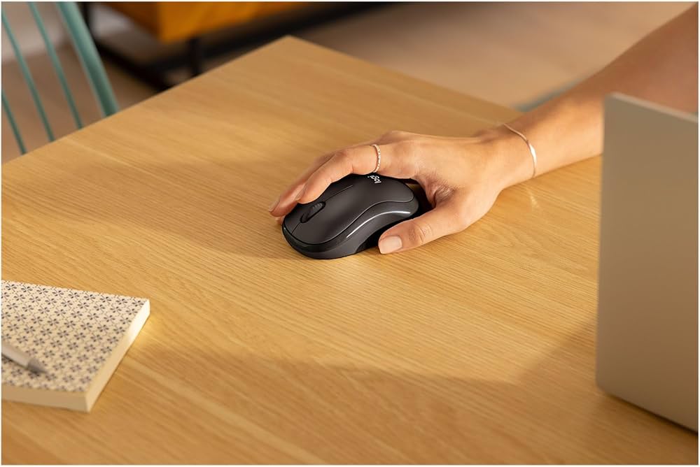 Logitech M240 Silent Bluetooth wireless mouse with compact design and smooth tracking, ideal for portable use and quiet operation.