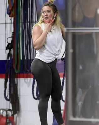 Problems Solved women's high waist scrunch butt leggings with lifting and push-up design, shown on a model in a gym setting.