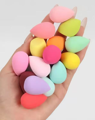 Set of 20 latex-free professional makeup sponges from Problems Solved, showing various sizes and shapes for blending makeup.