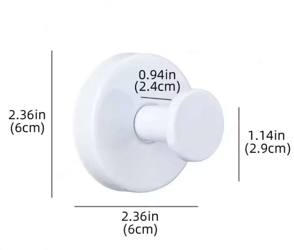 Metal suction cup towel hook from Problems Solved, mounted in a bathroom, holding a towel for easy access and organization.