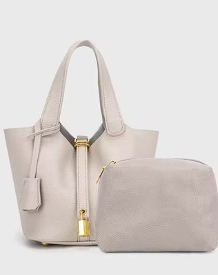 Classic Vegetable Women's Handbag by Problems Solved, simple bucket bag with a smooth vegetable-tanned leather finish.
