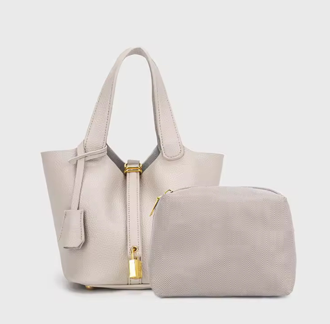 Classic Vegetable Women's Handbag by Problems Solved, simple bucket bag with a smooth vegetable-tanned leather finish.