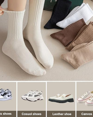 Six pairs of Problems Solved women's crew ankle socks in breathable cotton, shown laid flat in assorted colors.