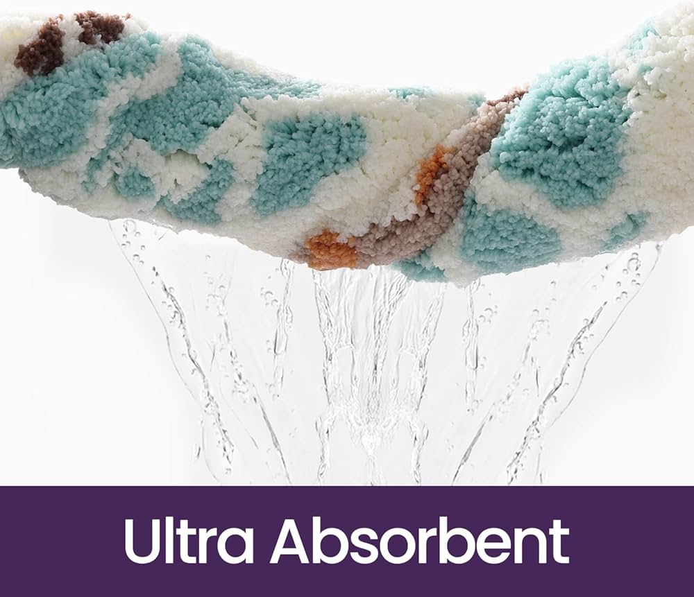 Problems Solved oval bath mat with cute pattern, 61 x 110 cm, non-slip, soft, absorbent, washable bathmat shown on bathroom floor.