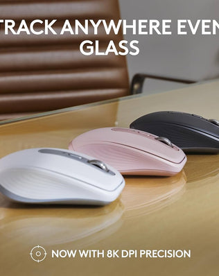 Logitech MX Anywhere 3S compact wireless mouse with fast scrolling and 8K DPI on a sleek workspace.