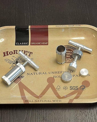 Problems Solved Tool Pollen T Press with T-handle, durable herb pen used for pressing pollen and herbal concentrates.
