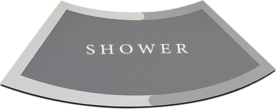 Problems Solved curved shower mat with absorbent, non-slip surface and quadrant design for safe, comfortable bathroom use.
