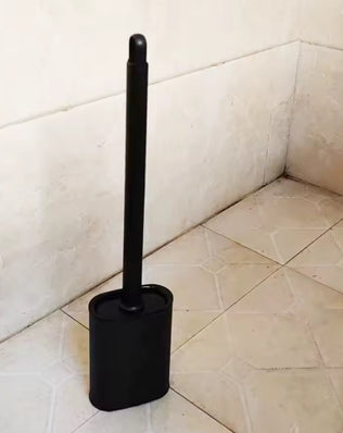 Stainless steel base toilet brush holder by Problems Solved with a standing toilet cleaning brush for bathroom cleaning.