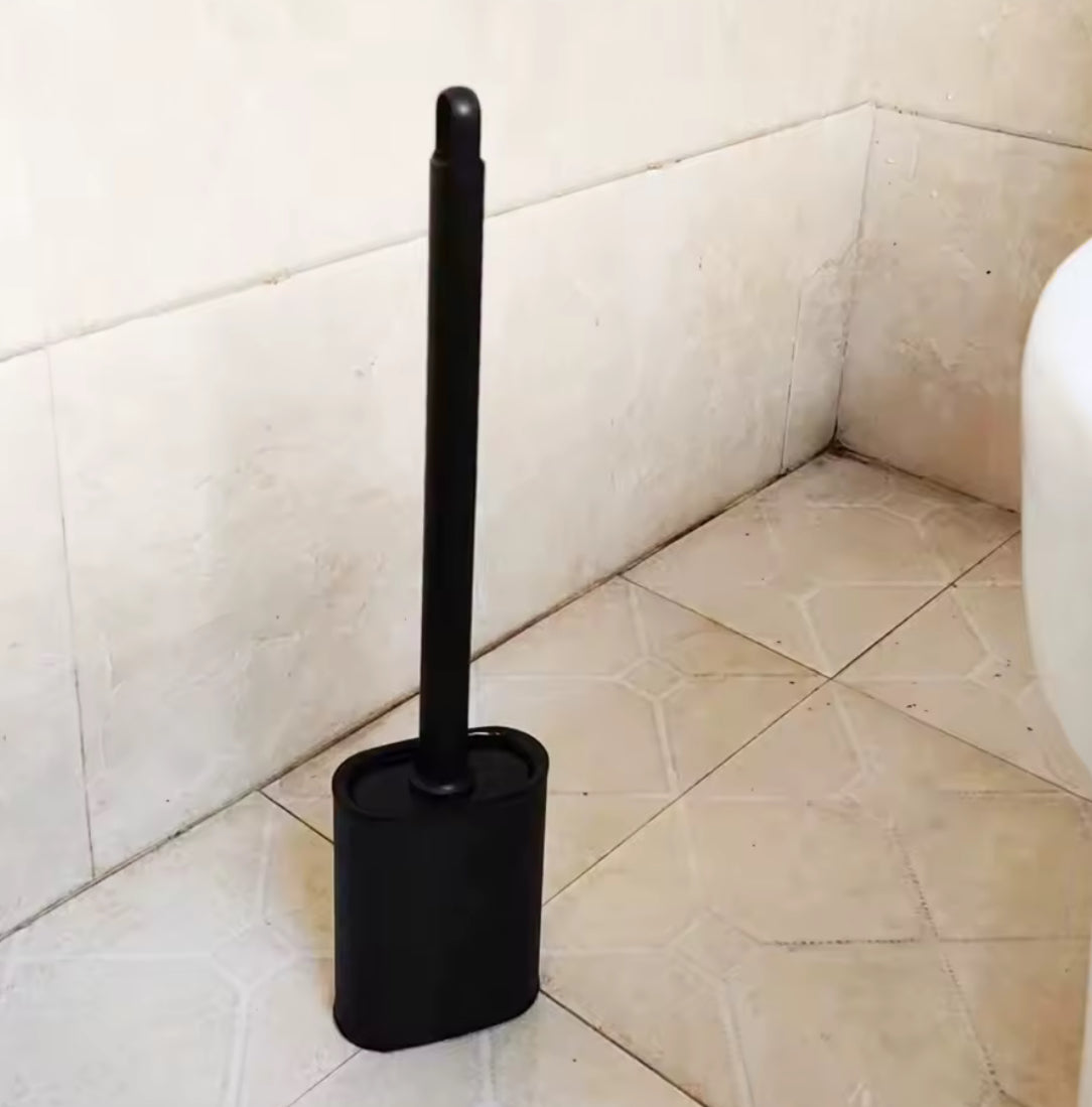 Stainless steel base toilet brush holder by Problems Solved with a standing toilet cleaning brush for bathroom cleaning.