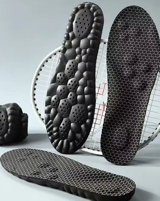 Two pairs of breathable, soft shoe pads from Problems Solved designed for comfortable foot massage and support inside shoes.