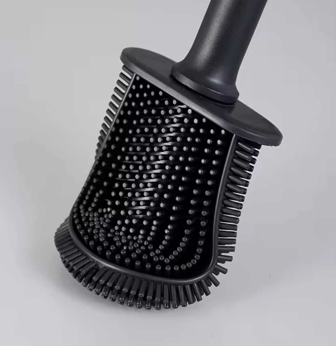 Stainless steel base toilet brush holder with standing toilet cleaning brush from Problems Solved, designed for bathroom sanitation.