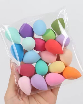 Set of 20 latex-free professional makeup sponges from Problems Solved, soft and versatile for flawless application.