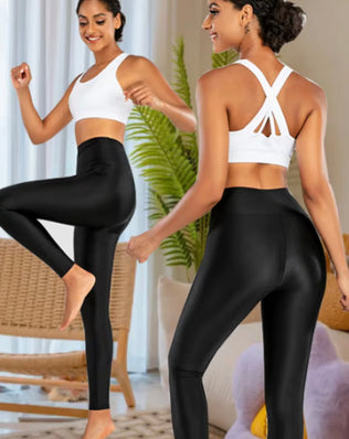 Problems Solved shiny stage performance oil leggings, high elastic skinny fit, close-up of reflective, smooth, metallic fabric.