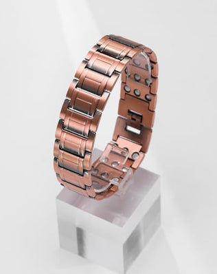 Copper magnetic bracelet for men by Problems Solved, featuring a sleek design with strong magnets and 99% pure copper.