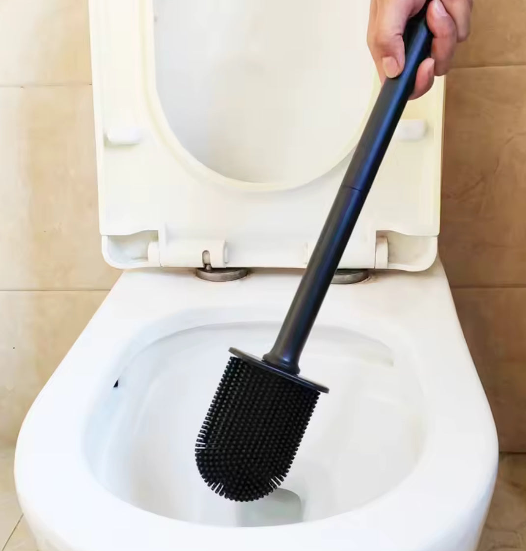 Stainless steel base toilet brush holder with standing toilet cleaning brush from Problems Solved, designed for bathroom sanitation.