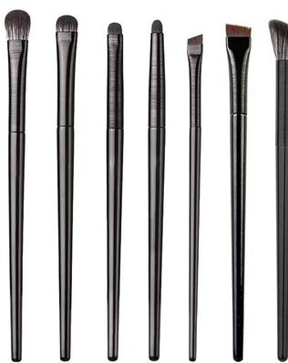 Set of nine Problems Solved eyeshadow makeup brushes for precise eye makeup application and blending in a professional brush set.