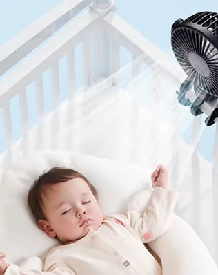 Mini Portable Pram Fan by Problems Solved, rechargeable clip-on stroller fan with detachable blades for cooling on the go.