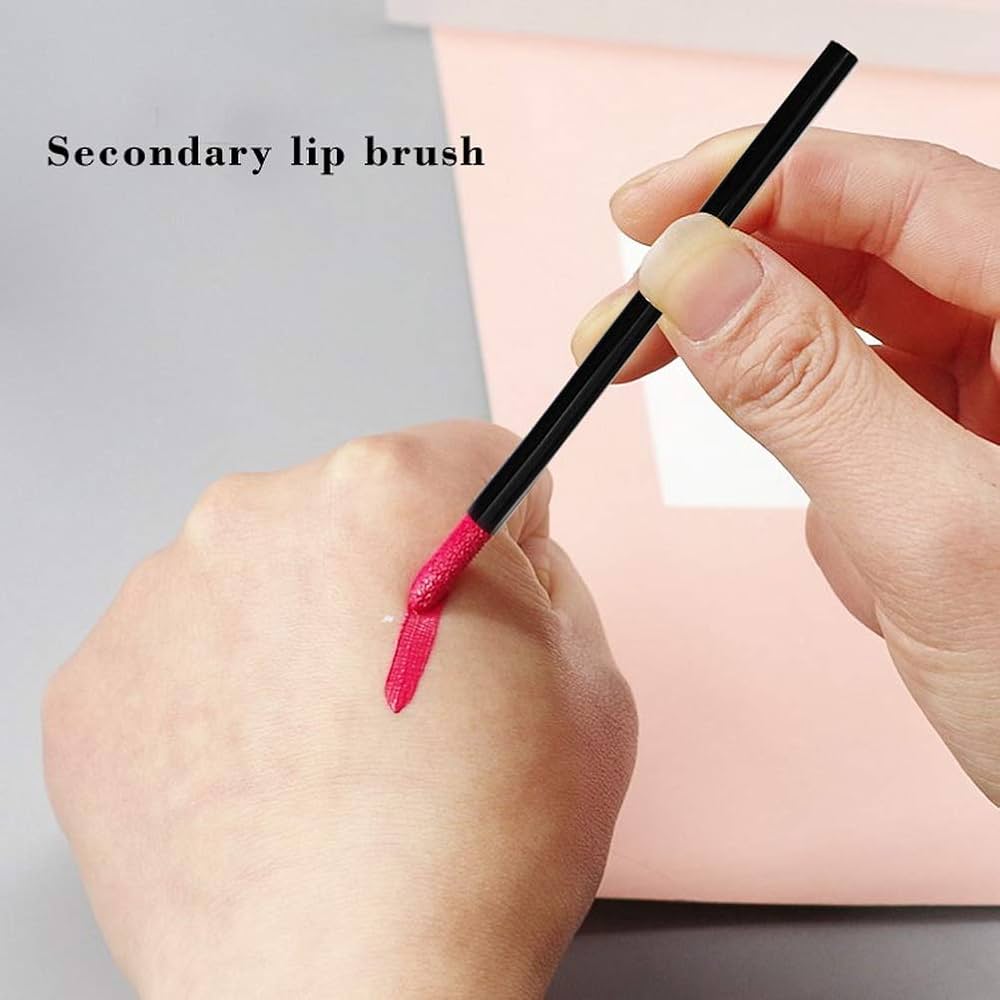 Set of 200 black disposable lip brushes for lipstick and lip gloss application, made by Problems Solved, shown in a neat arrangement.
