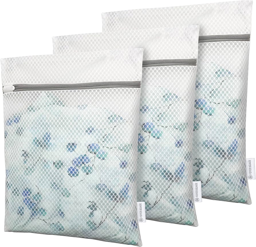 Three mesh laundry bags with zippers for delicates and socks, small washing bags by Problems Solved displayed in the image.