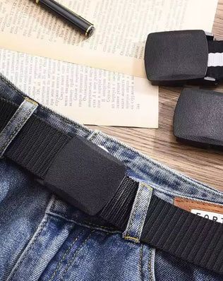Men's outdoor casual canvas belt by Problems Solved with a metal-free buckle, shown in a close-up view.