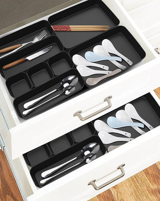 Problems Solved 16-piece drawer organizer box set for kitchen and bathroom storage, with compartments for efficient organization.