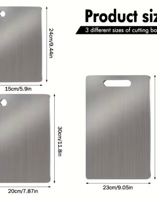 Set of three stainless steel cutting boards from Problems Solved with non-slip bases, dishwasher safe, ideal for kitchen prep.