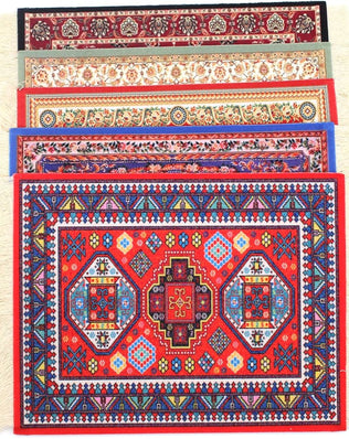 Creative mini rug mouse mat with oriental carpet pattern made of textile fabric by Problems Solved.